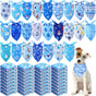 Collection of blue dog bandanas with winter-themed designs, displayed with a dog wearing one.